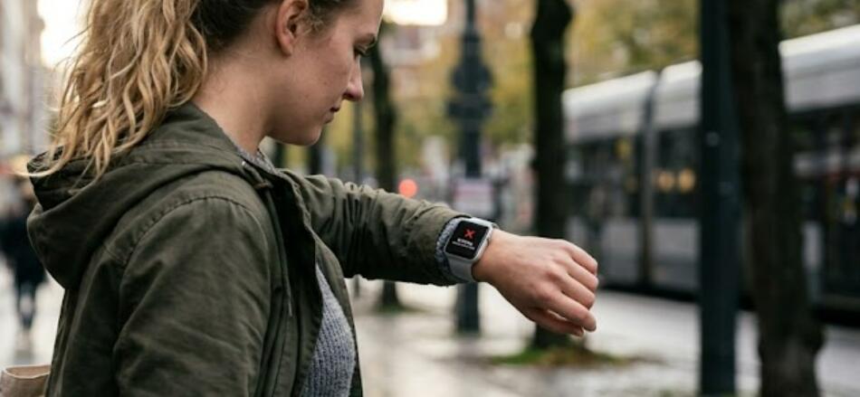 A lady is trying to call on her smartwatch